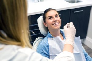 woman sitting in dental chair